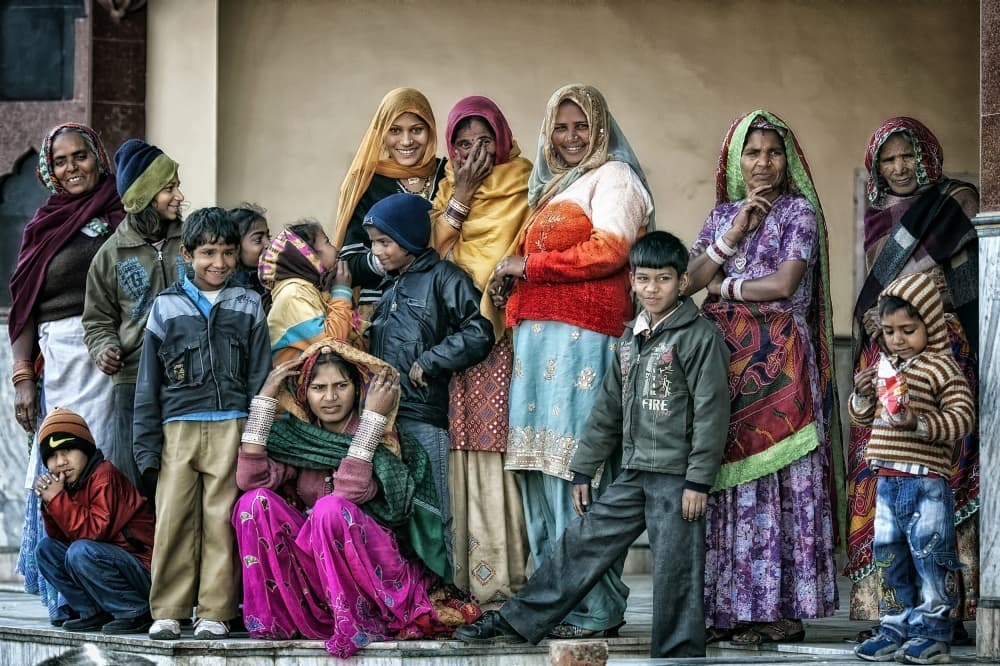 Colorful Indian Family Group by Piet Flour — canvas wall art