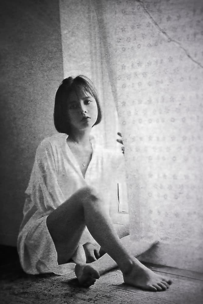 Thoughtful Gaze By Window by cindy ahn — canvas wall art