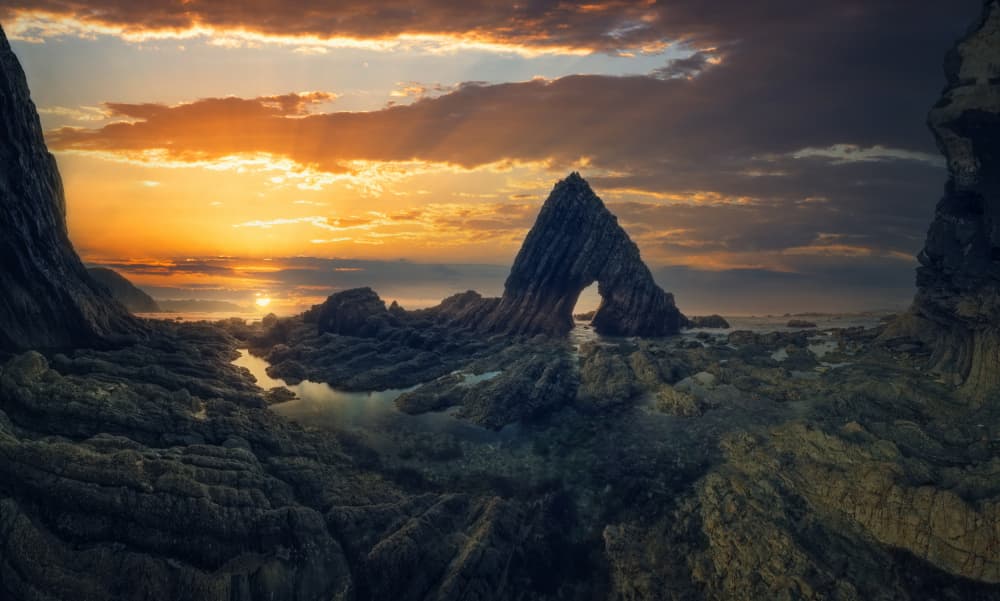 Dramatic Sea Arch Sunset by David Martin Castan — canvas wall art