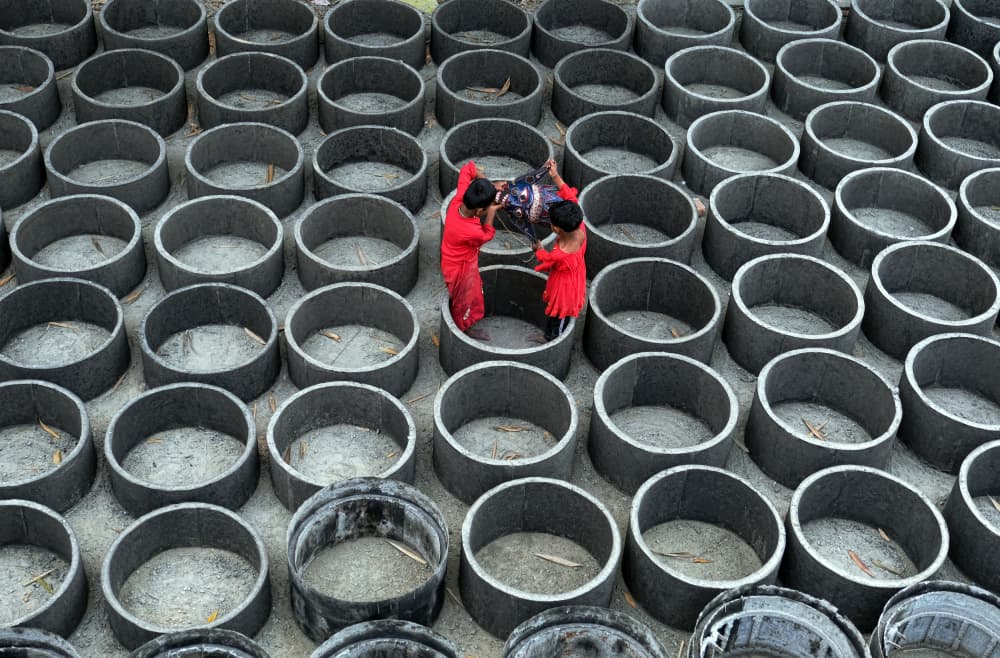 Red Figures Concrete Rings by Ajit Kumar Majhi — canvas wall art