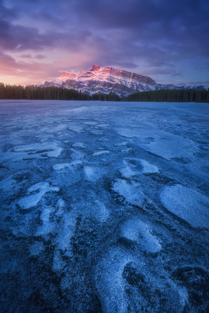 Frozen Lake Alpenglow by Carlos F. Turienzo — canvas wall art