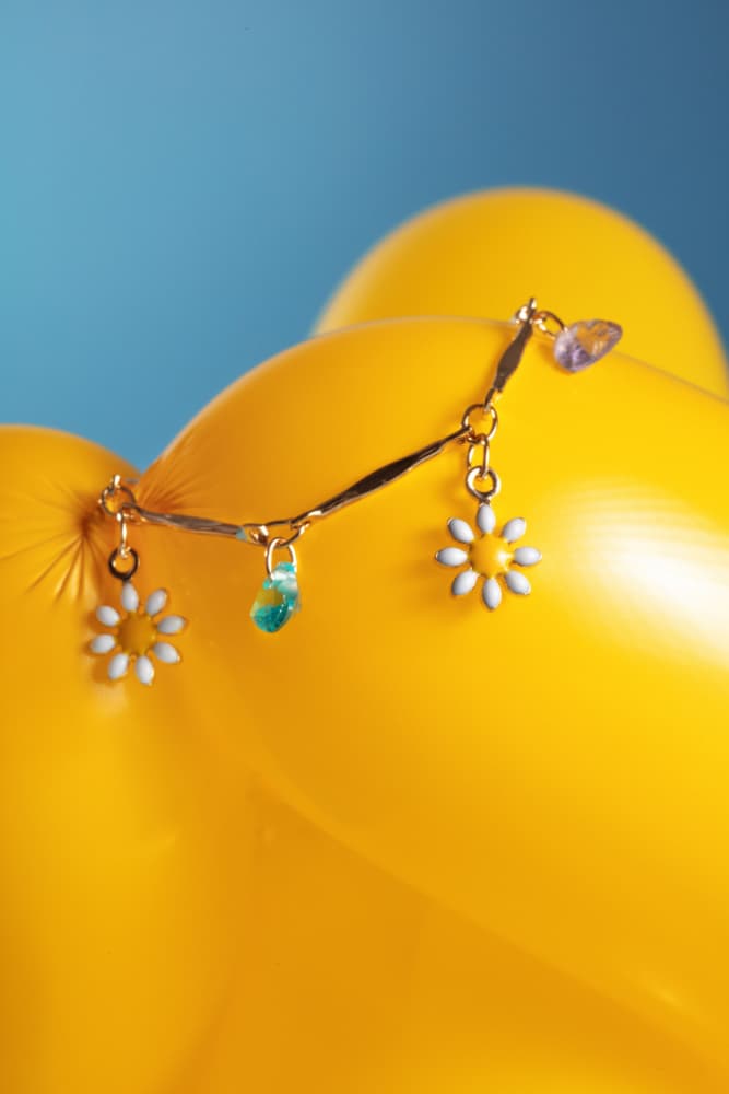 Colorful Daisy Charms by Julia Ramiro — canvas wall art