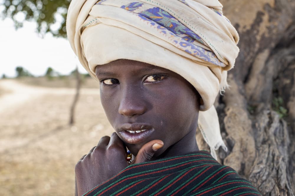 African Youth Portrait by Iris Wiener — canvas wall art