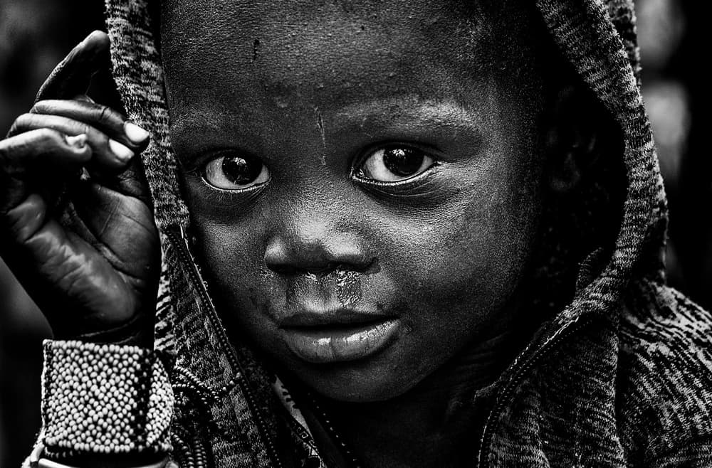 Child's Deep Gaze by Joxe Inazio Kuesta Garmendia — canvas wall art