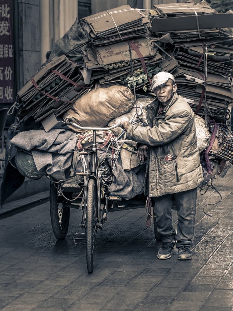 Urban Cardboard Collector by Eyal Alcalay — canvas wall art