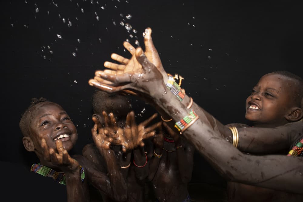 Happy Faces Water Fun by Iris Wiener — canvas wall art
