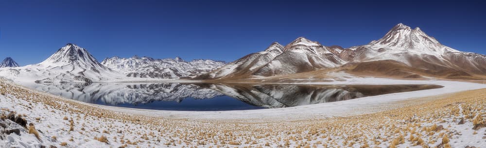 Snowy Mountain Lake Reflection by Adhemar Duro — canvas wall art