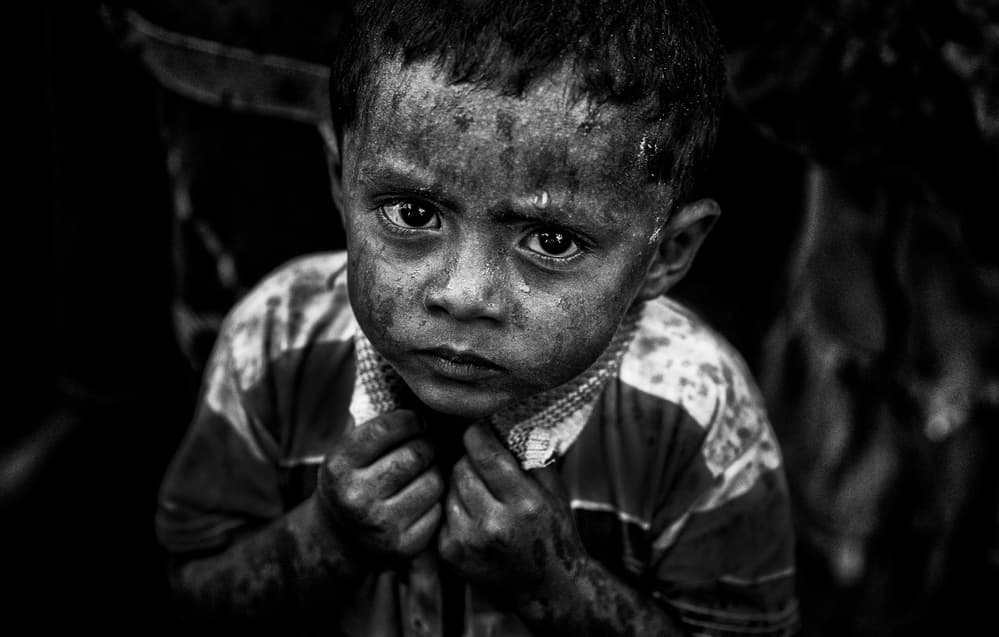 Intense Child Gaze by Joxe Inazio Kuesta Garmendia — canvas wall art
