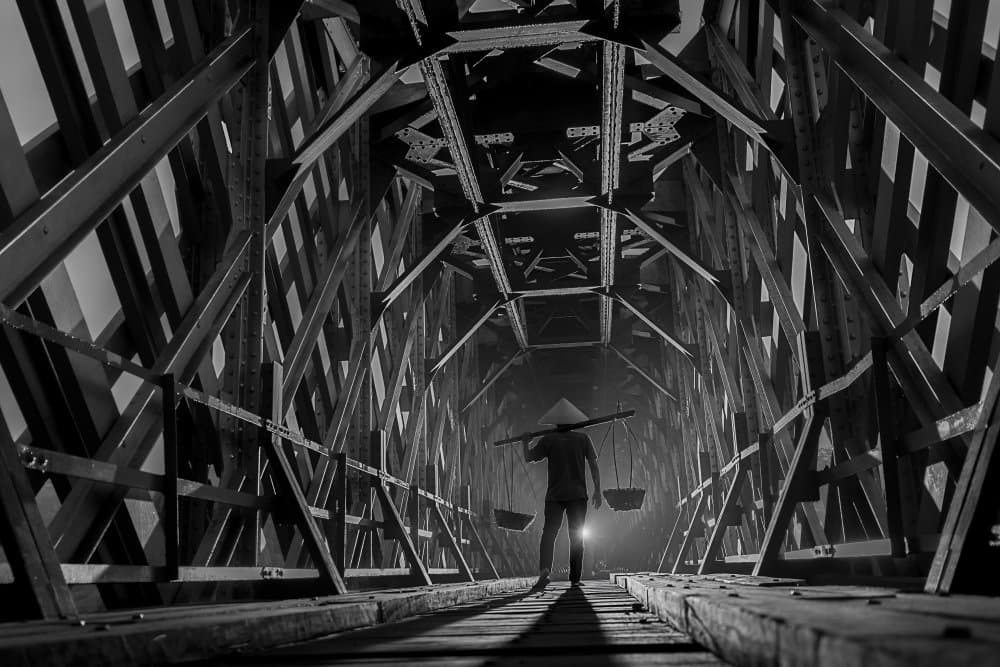 Man in Wooden Tunnel by Lisdiyanto Suhardjo — canvas wall art