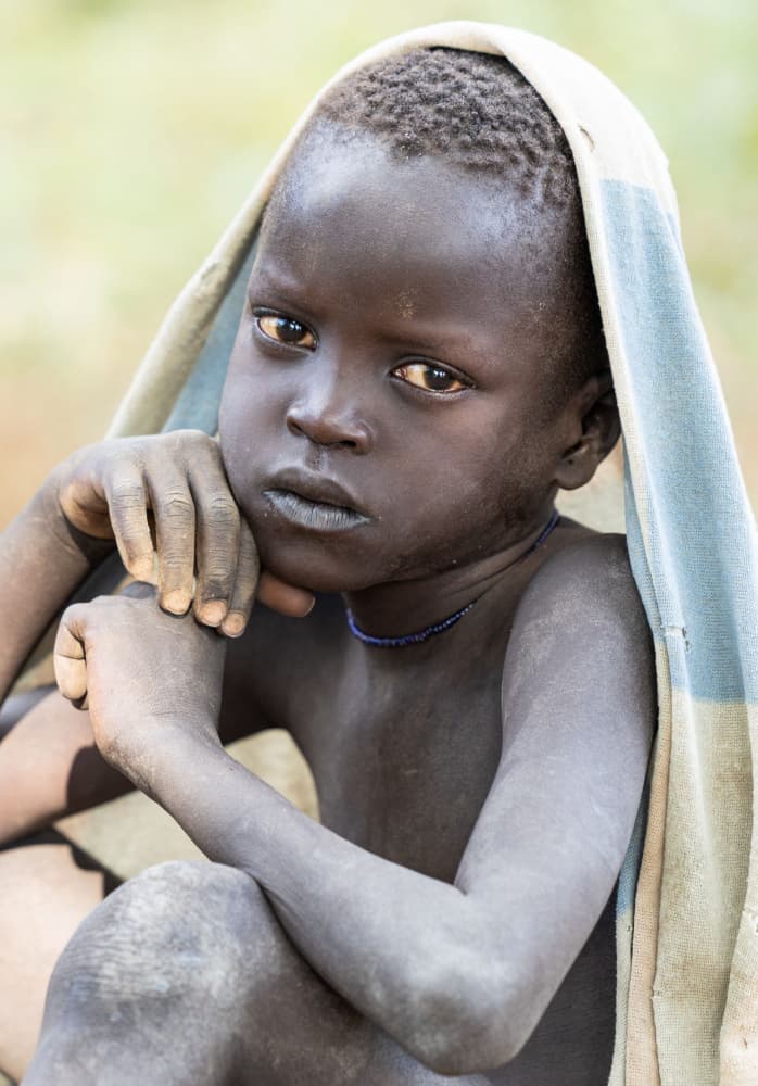 Thoughtful African Child by Hamza Qarooni — canvas wall art
