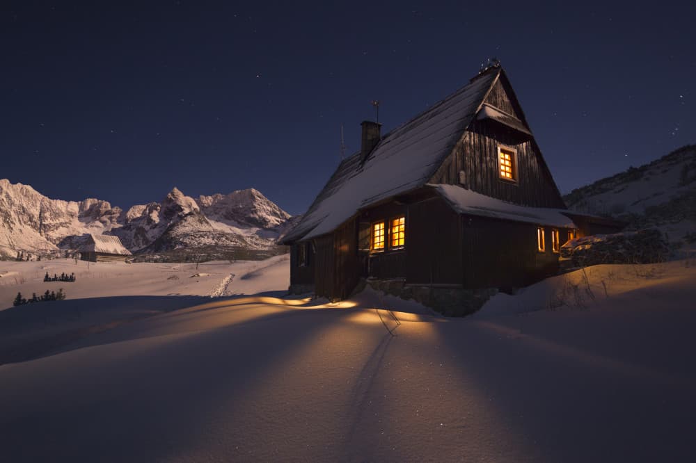 Alpine Cabin Under Stars by Karol Nienartowicz — canvas wall art