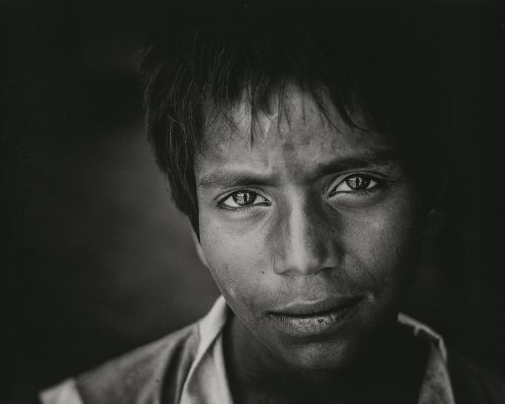 Boy's Soulful Gaze by Ariel Ariel — canvas wall art
