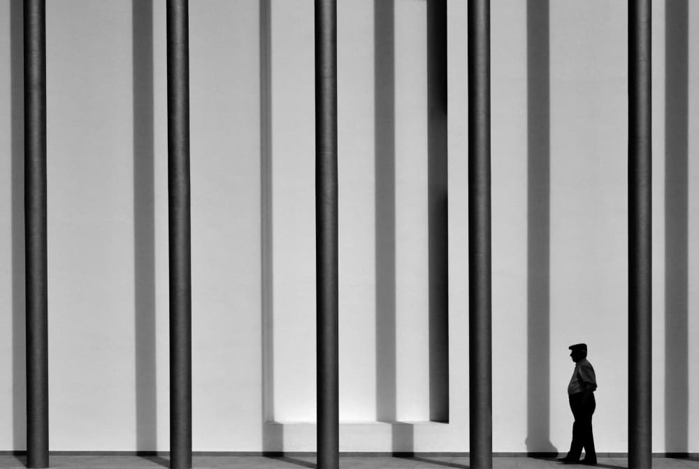 Man Amidst Shadows by Florentinus Joseph — canvas wall art