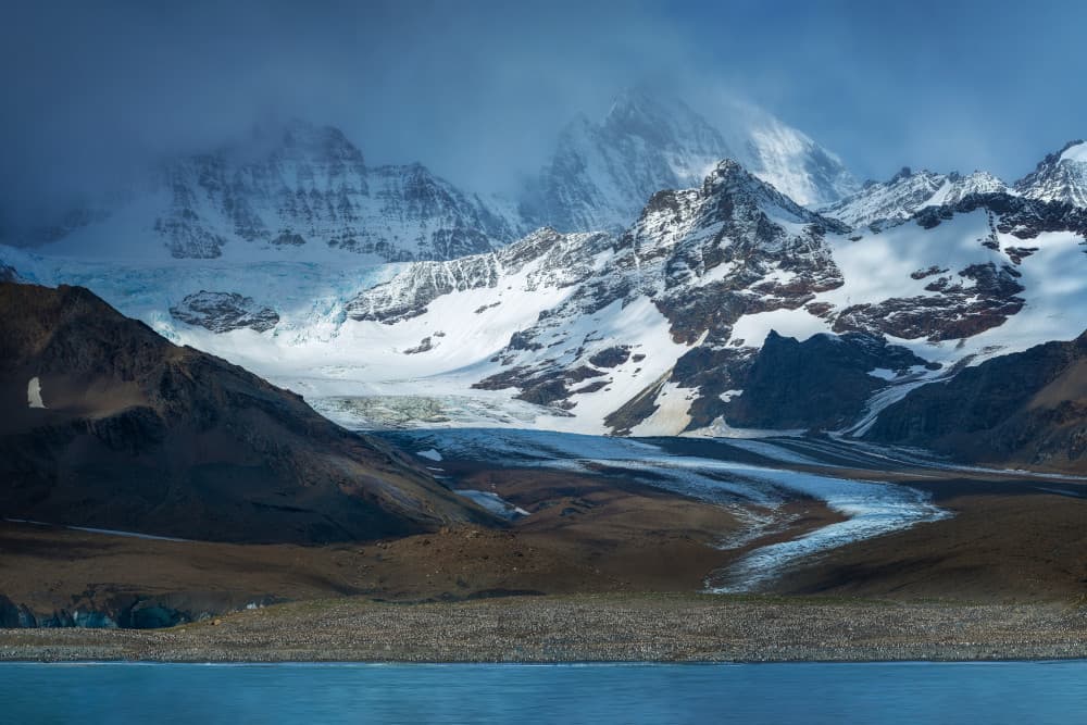 Penguin Colony Glacier Mountains by Mei Xu — canvas wall art