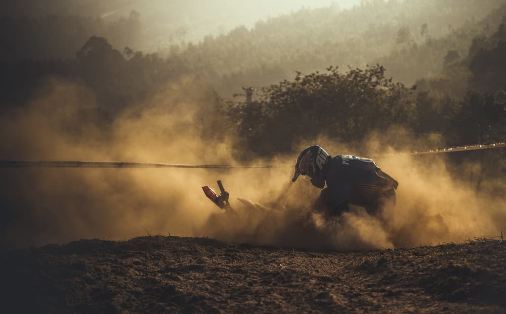 Dusty Motocross Action by Carlos Gonzalez — canvas wall art
