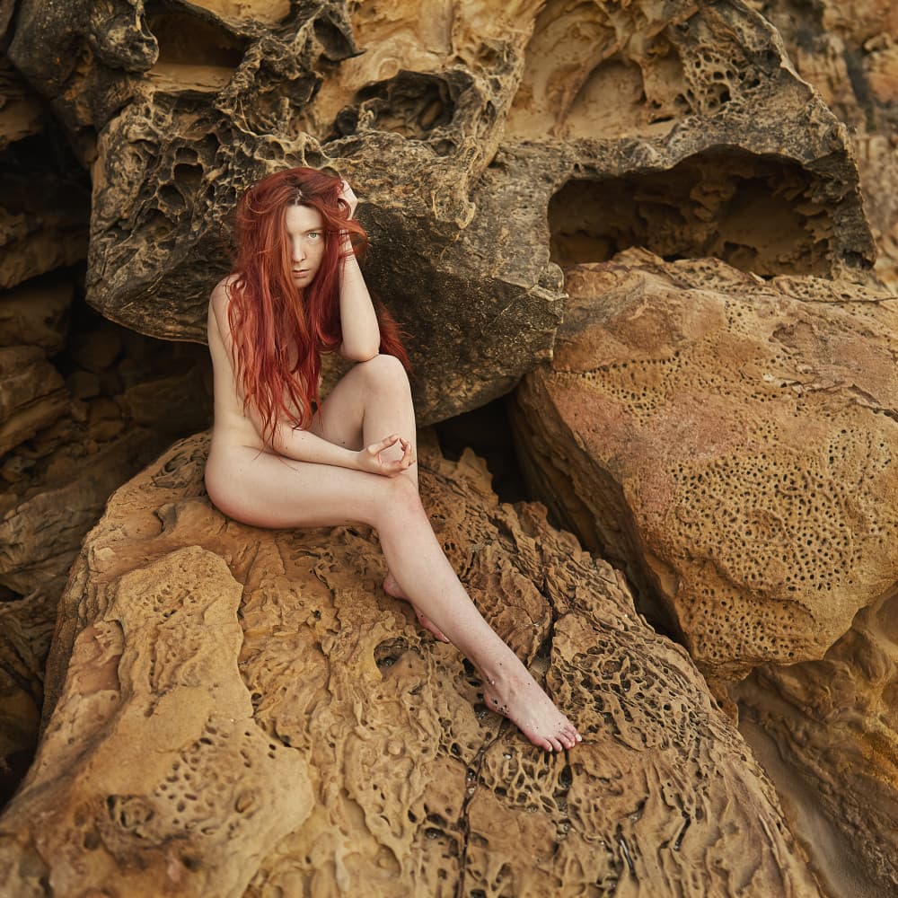 Ginger Woman on Rocks by michel genève — canvas wall art