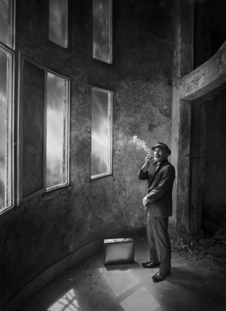 Contemplative Man with Pipe by Sebastian Kisworo — canvas wall art