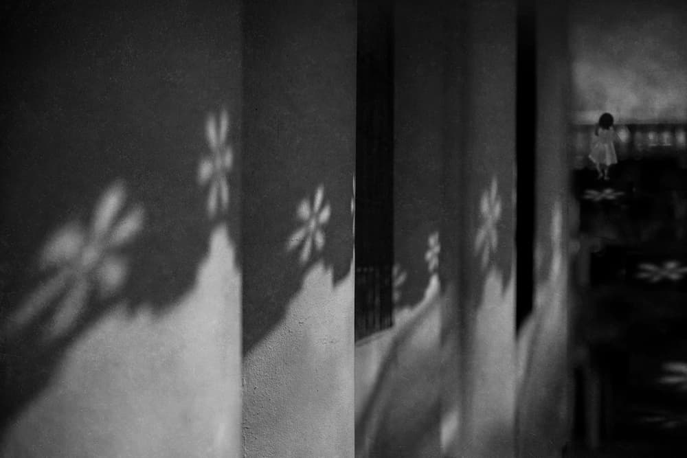 Child in Shadowed Hallway by Ekkachai Khemkum — canvas wall art