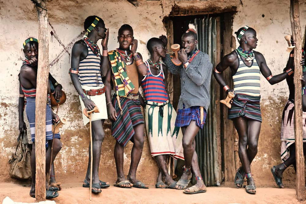 Traditional Tribal Men by Trevor Cole — canvas wall art