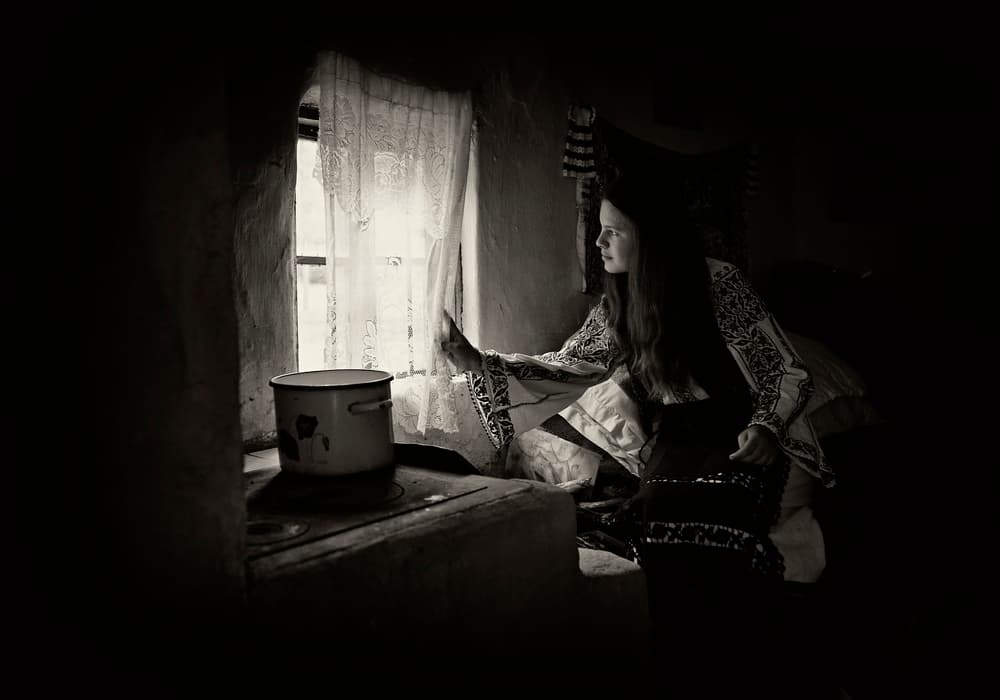 Woman By Window Light by Julien Oncete — canvas wall art