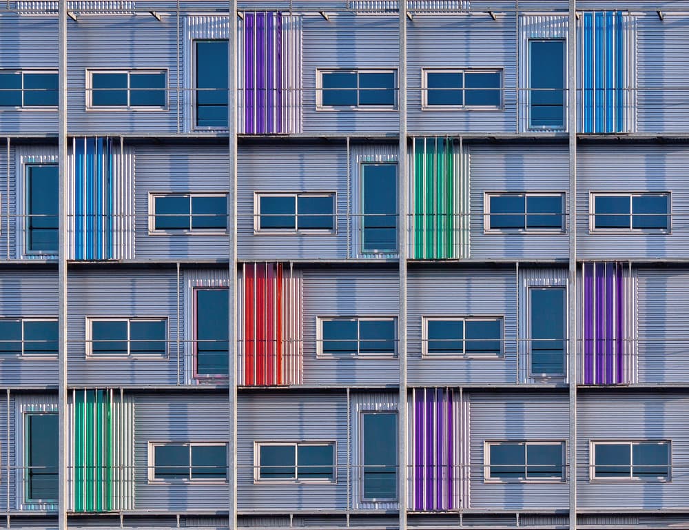 Colorful Building Facade by Theo Luycx — canvas wall art