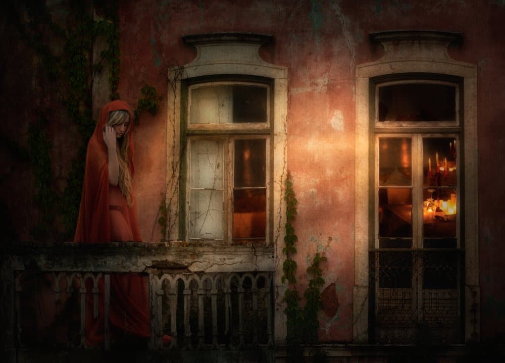Red Hood Balcony Glow by Charlaine Gerber — canvas wall art
