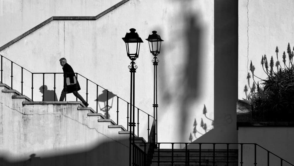 Man Walking Up Stairs by Carlos Costa — canvas wall art
