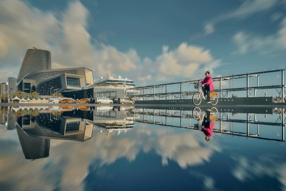 City Reflection Ride by MingLun Tsai (蔡明倫) — canvas wall art
