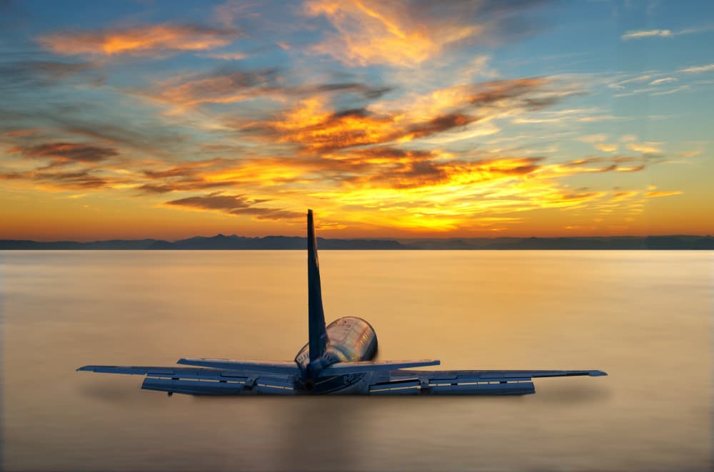 Submerged Plane Sunset by George Digalakis — canvas wall art