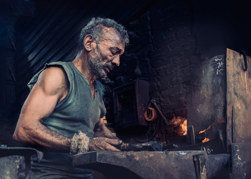 Blacksmith At The Forge by Hesham Ragab — canvas wall art