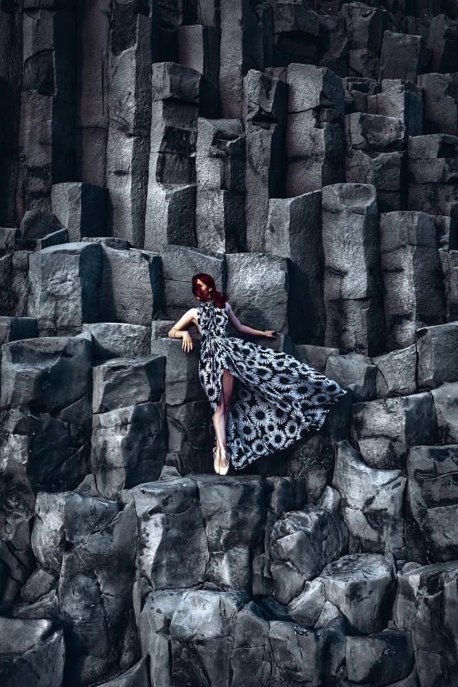 Woman on Basalt Columns by Ruslan Bolgov — canvas wall art