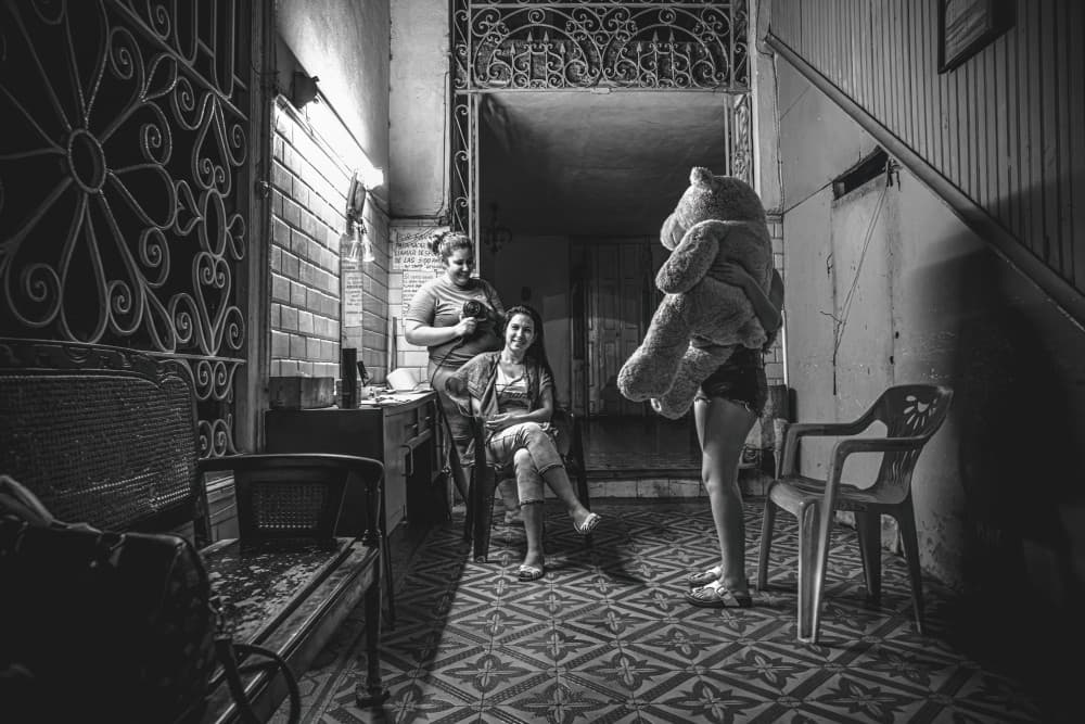 Candid Family Moment by Marco Tagliarino — canvas wall art