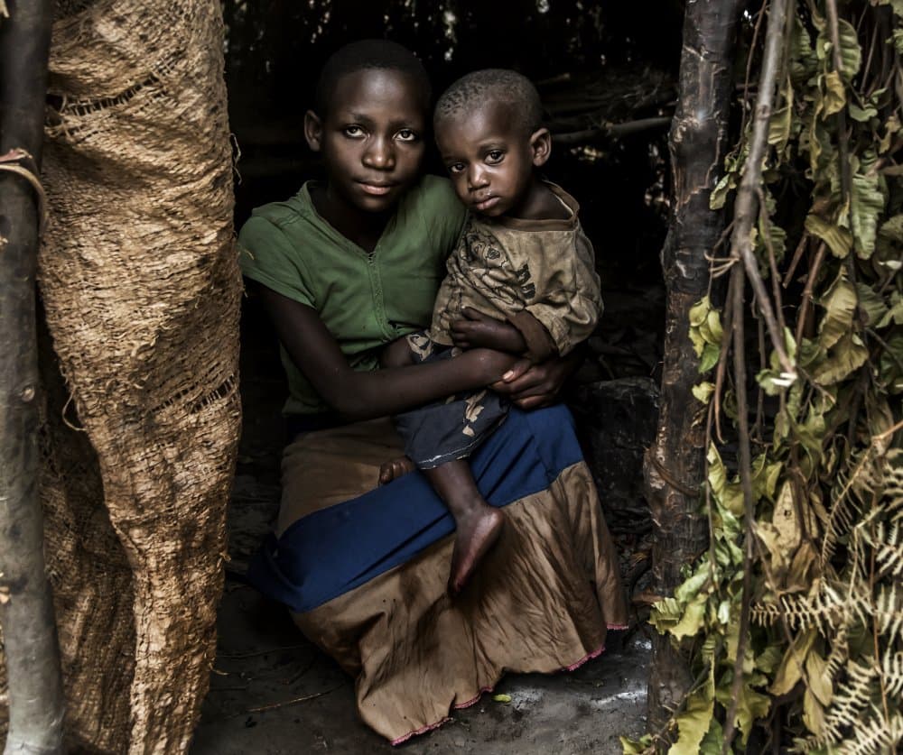 Young African Siblings by Giuseppe DAmico — canvas wall art