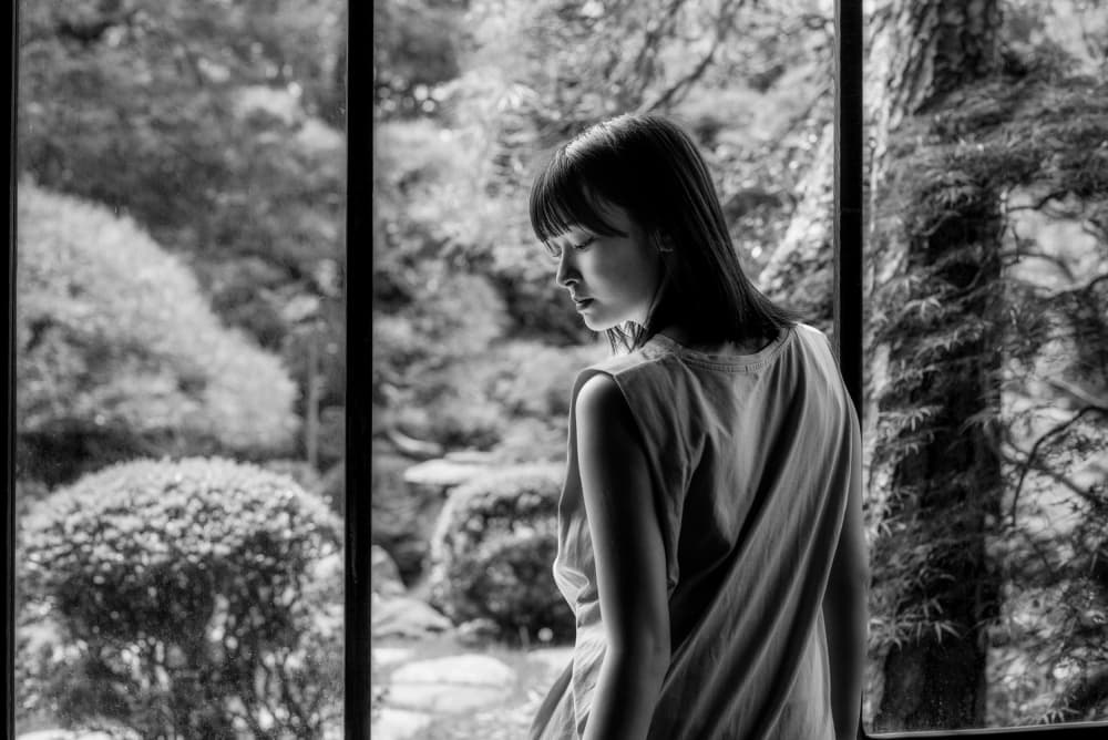 Woman in Serene Garden by Yuzo Fujii — canvas wall art