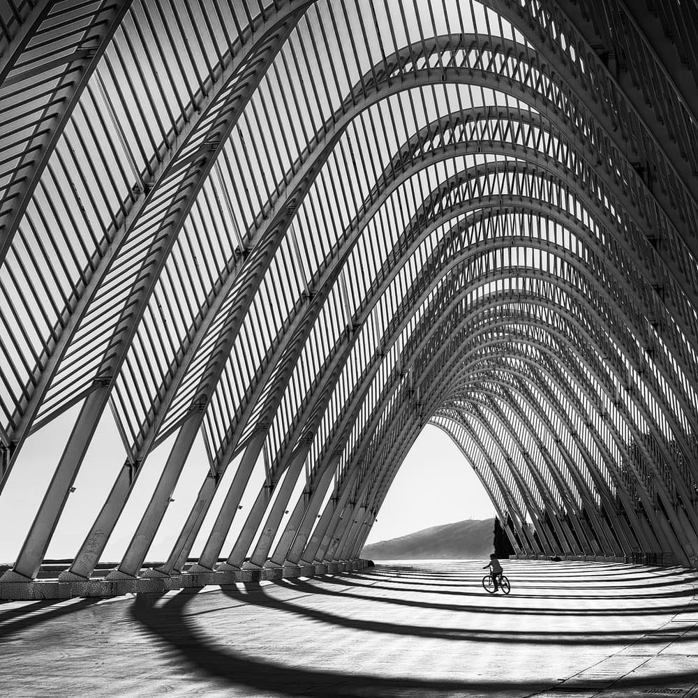 Archway Cyclist by George Digalakis — canvas wall art
