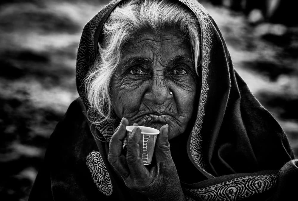 Soulful Woman With Cup by Joxe Inazio Kuesta Garmendia — canvas wall art