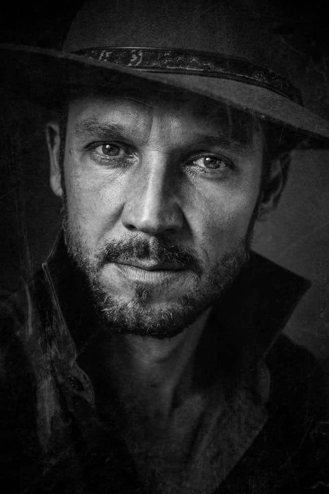 Man's Intense Gaze by Bez Dan — canvas wall art
