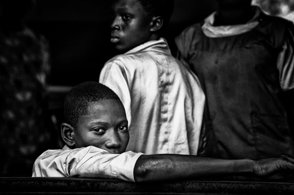 Children's Candid Gaze by Joxe Inazio Kuesta Garmendia — canvas wall art
