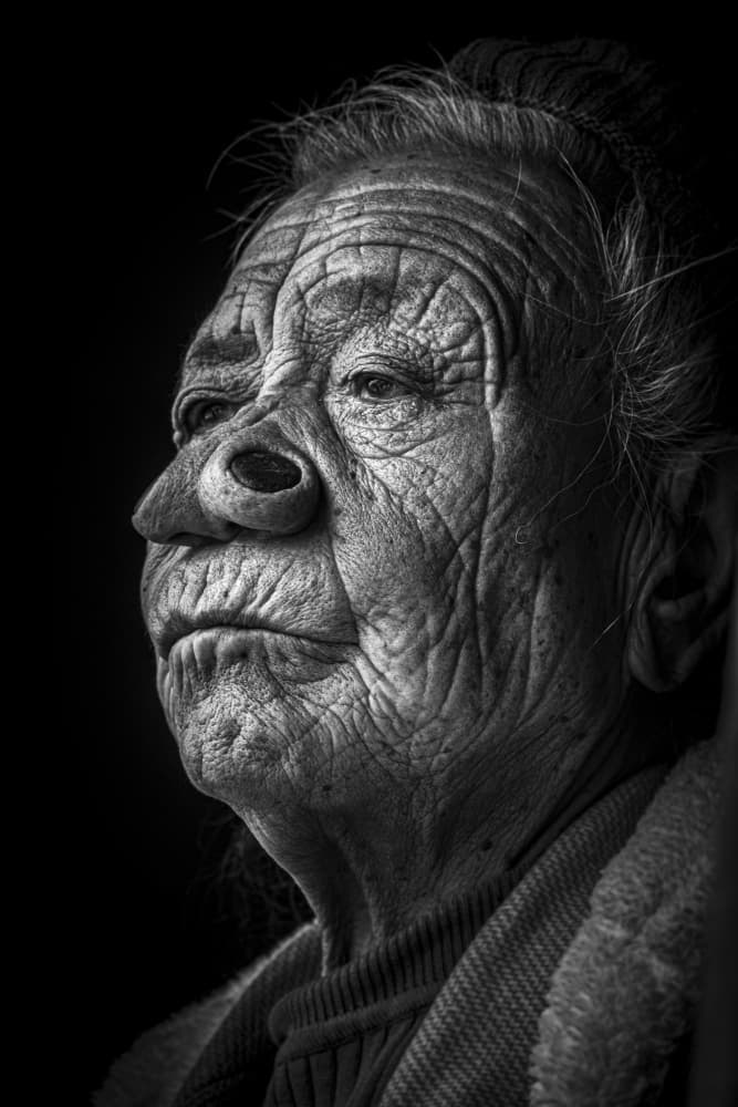 Pensive Elderly Woman by Elena Molina — canvas wall art