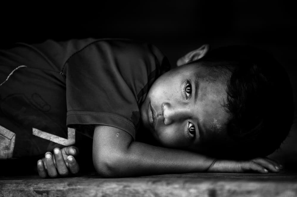Pensive Young Boy by Marco Tagliarino — canvas wall art