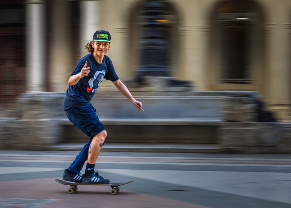 Smiling Skateboarder by Irene Wu — canvas wall art