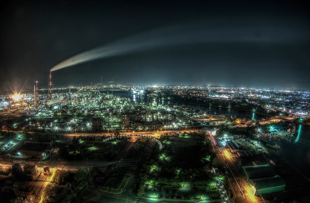 Glowing Industrial Night City by Tomoshi Hara — canvas wall art