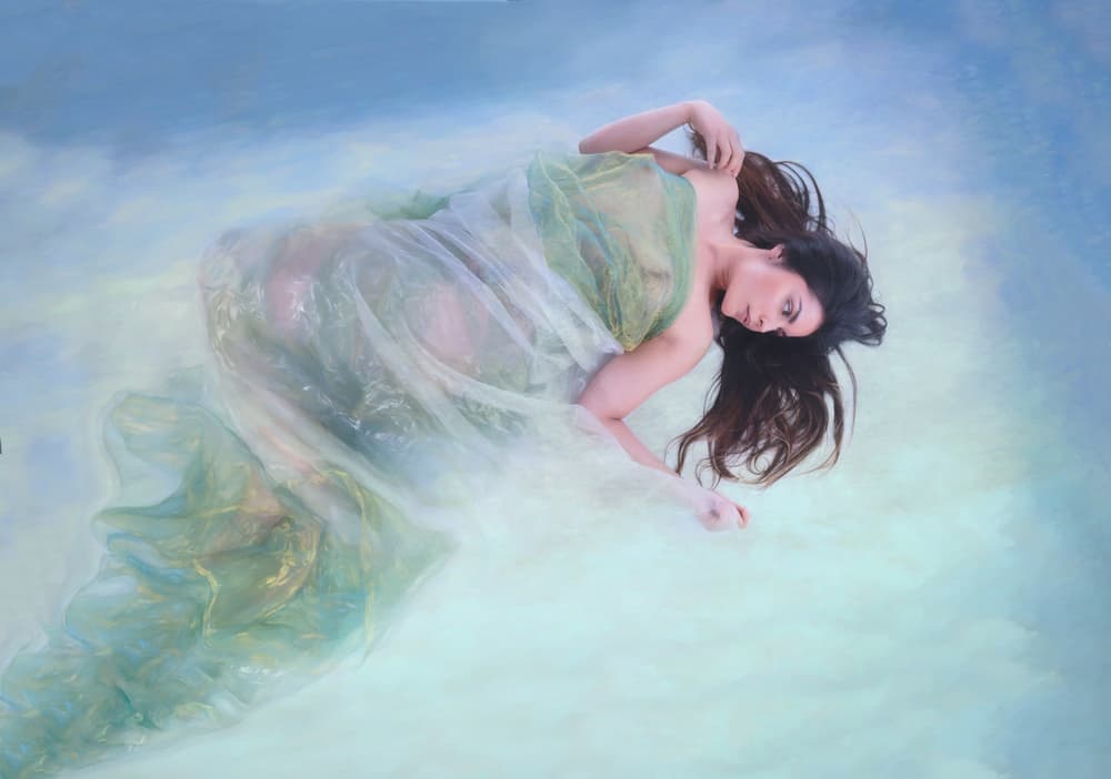 Dreamy Floating Woman by Colin Dixon — canvas wall art