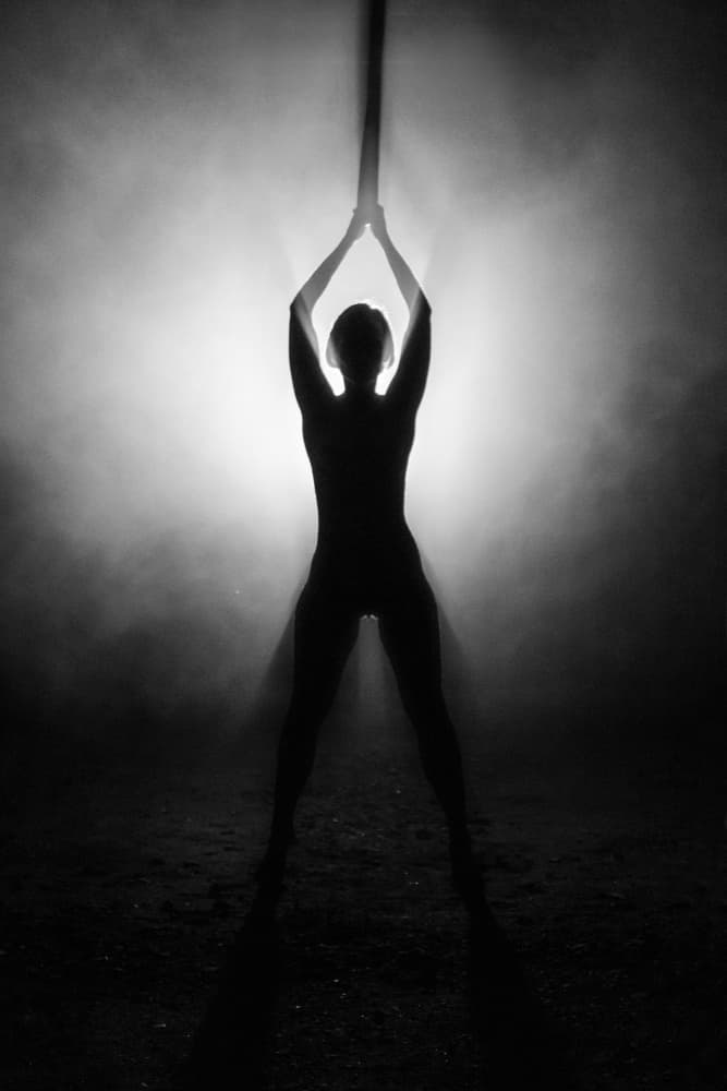 Woman in Glowing Smoke by Leszek Paradowski — canvas wall art