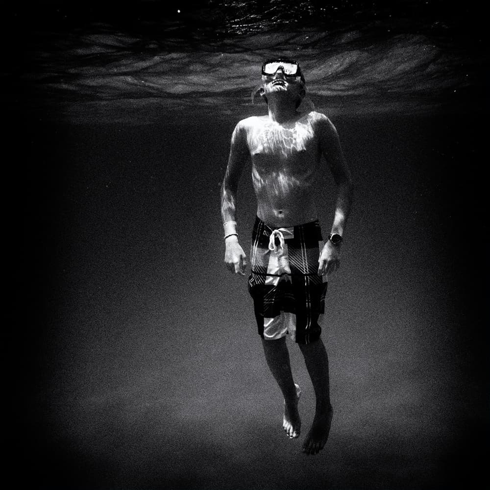 Serene Underwater Swim by Marcel Rebro — canvas wall art