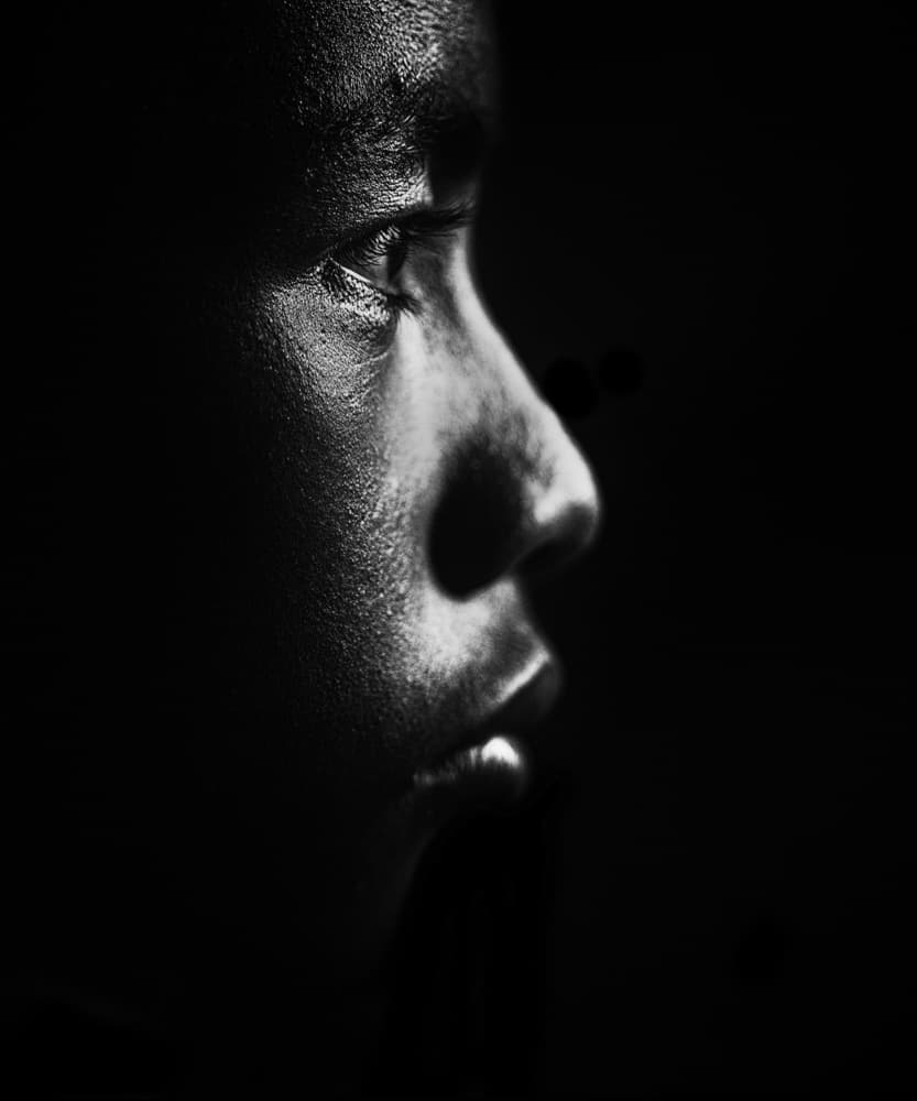 Pensive Youth Profile by Andi Halil — canvas wall art
