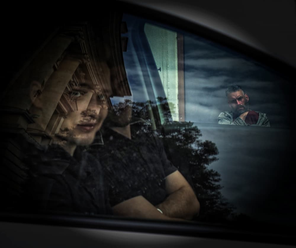 Men in Car Reflections by Mirela Momanu — canvas wall art