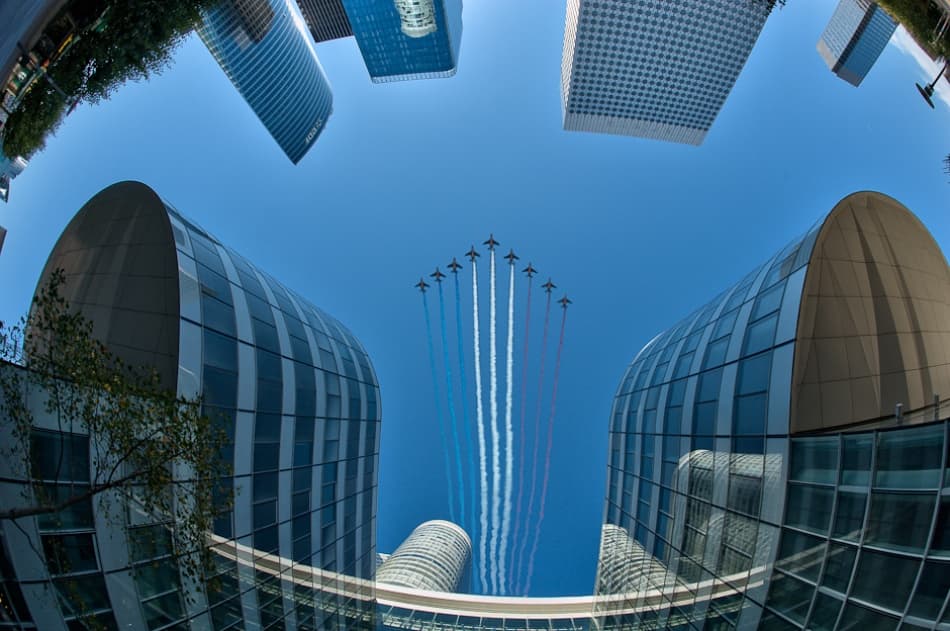 Patriotic City Flyover by Marc Pelissier — canvas wall art