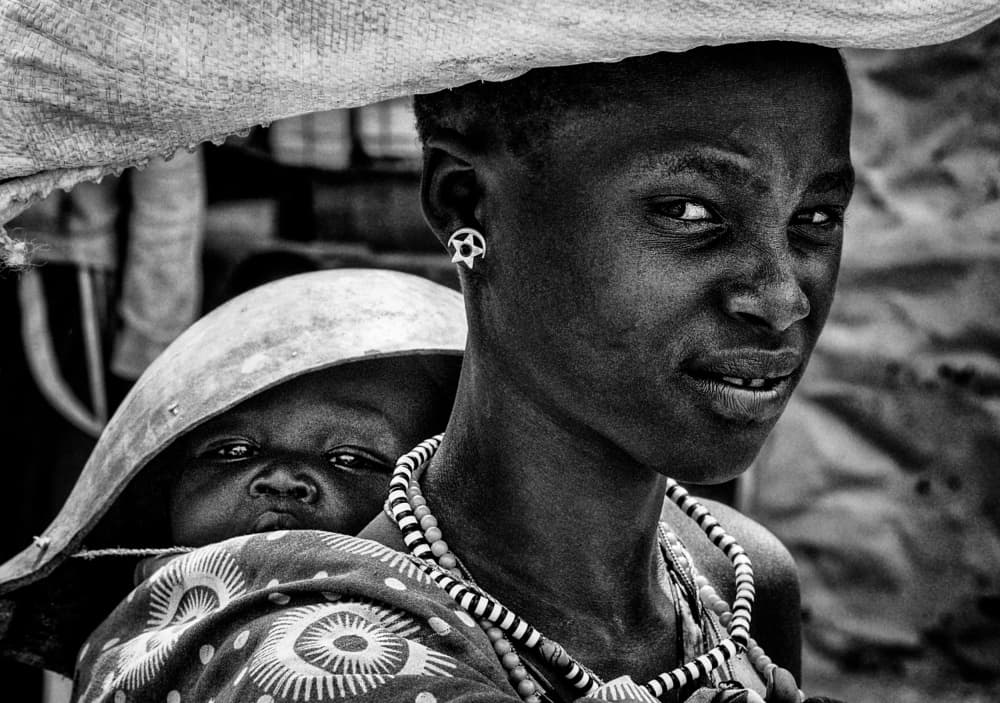 African Mother and Child by Joxe Inazio Kuesta Garmendia — canvas wall art