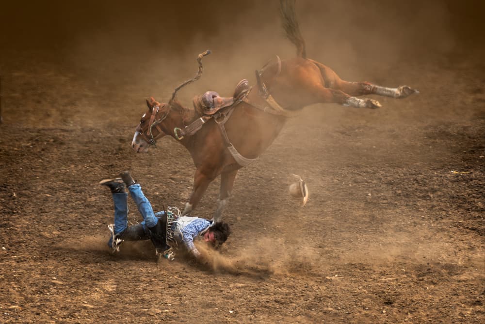 Rodeo Cowboy Fall by Leeian Dai — canvas wall art